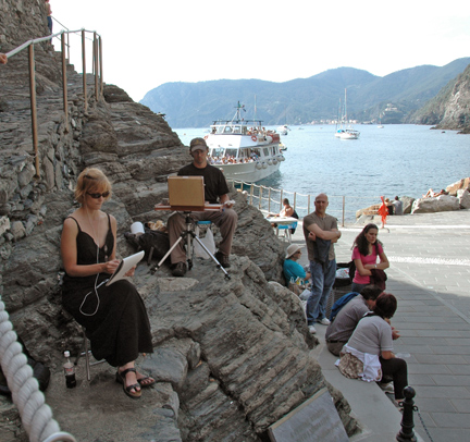 Susan and Scott painting on hillside